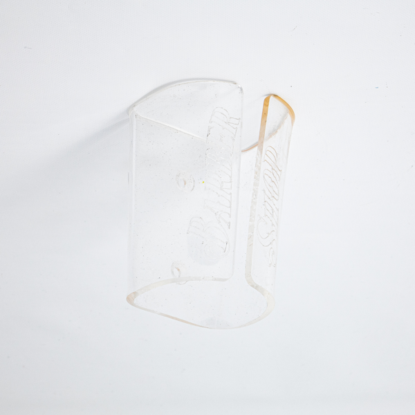 Soporte para maquina en acrílico transparente